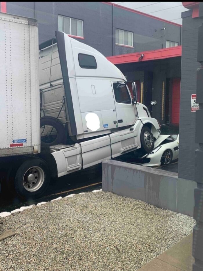 Boss Stops Paying Drivers, So One Parks A Big Truck On His Ferrari And Walks Away