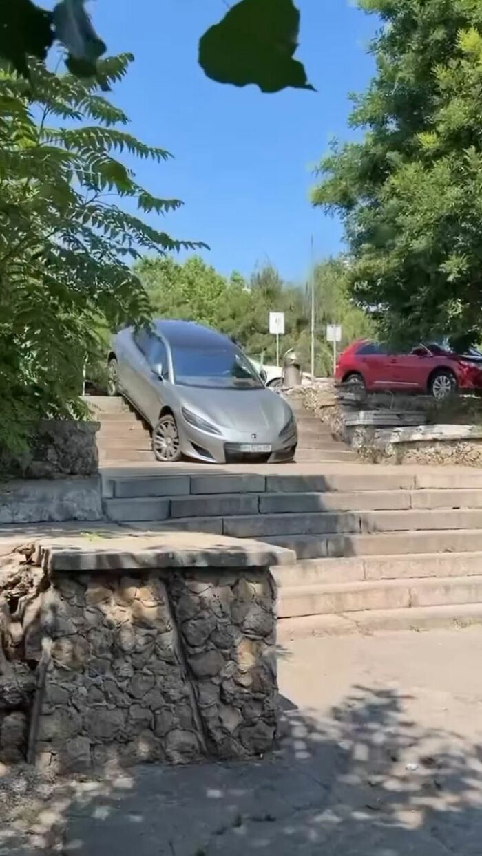 Car on the Stairs—Again! This Time with a Gentleman Behind the Wheel