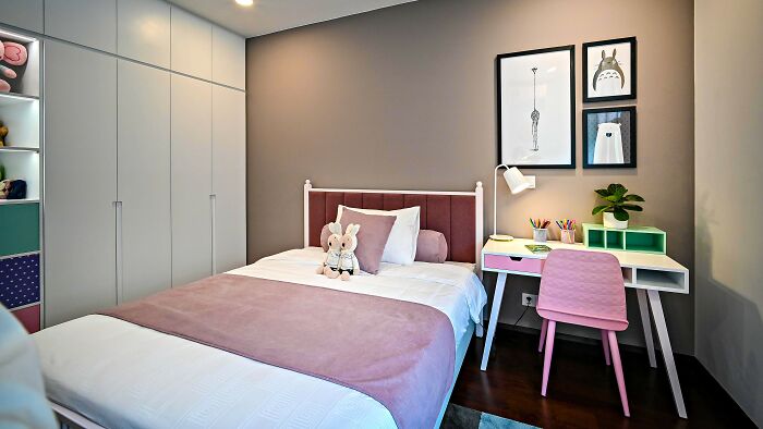 Their place is a shrine to childhood — posters, stuffed animals, trophies. Cute throwback or can’t-let-go vibe?