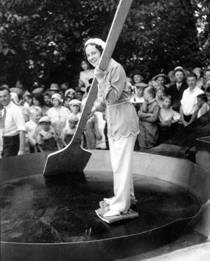 Woman Standing In Giant Skillet With Bacon On Feet, 1929 (Breakfast Champ)