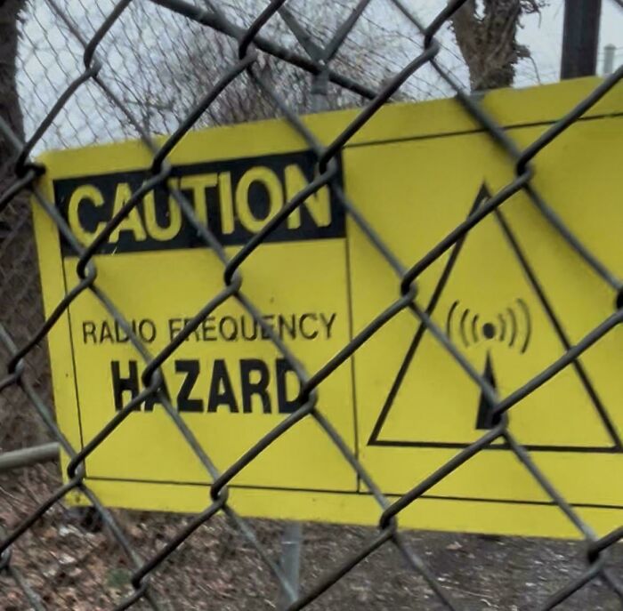 Thought About Climbing This Tower, Then I Saw This Creepy Sign. Anyone Know What It Means?