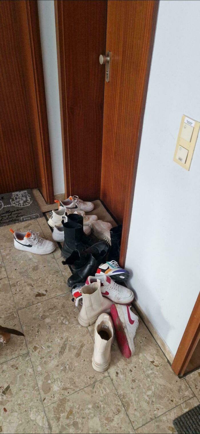 Neighbors’ Shoes Taking Over the Hallway