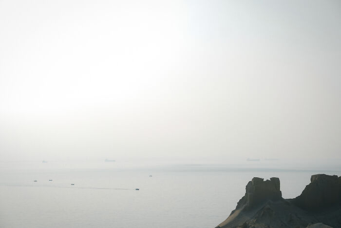 Big Ships Cruising The Strait Of Hormuz As Seen From The Island