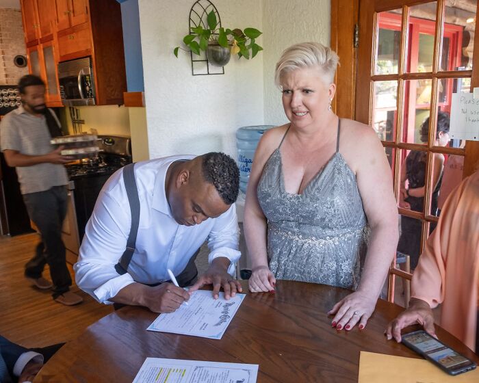 Signing The Marriage Certificate With A Forever Promise: ‘You’re Stuck With Me!’