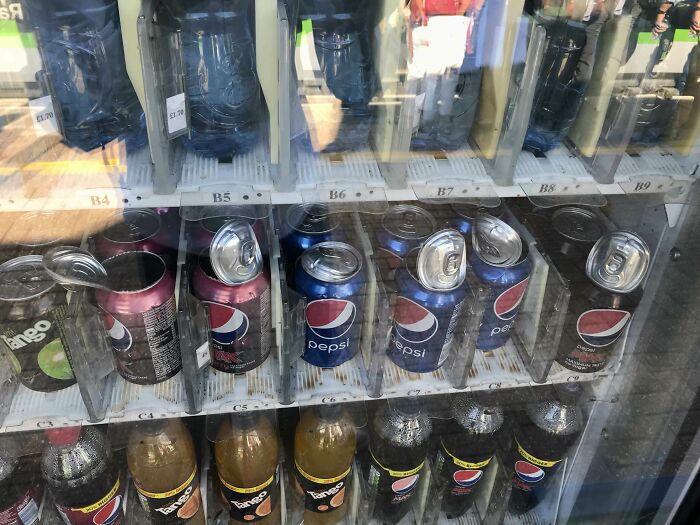 Heatwave Magic: Cans Exploding Inside a Vending Machine in Britain