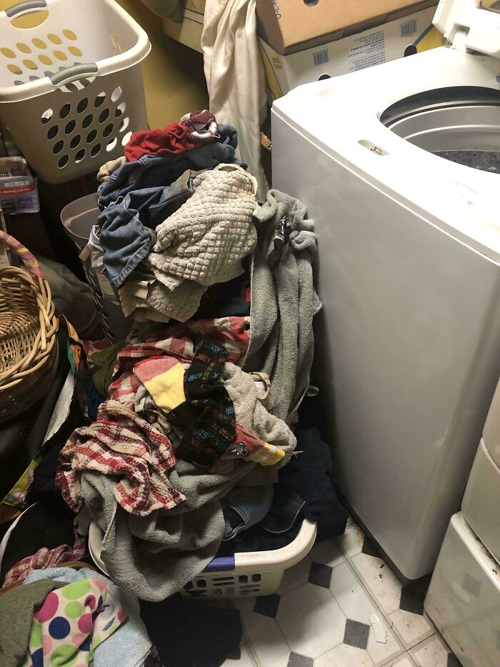 Gone For 2 Weeks, Then Left A Mountain Of Dirty Clothes Right By The Washer