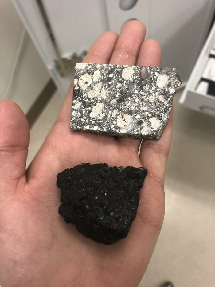 Holding Moon And Mars Rocks At The Same Time