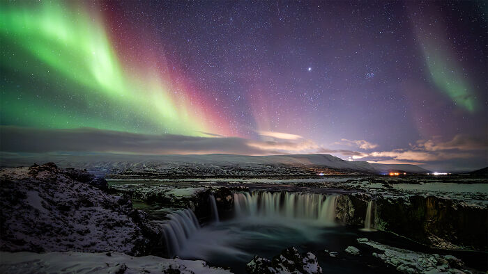"Aurora Painting The Waterfall" By Yifan Cao