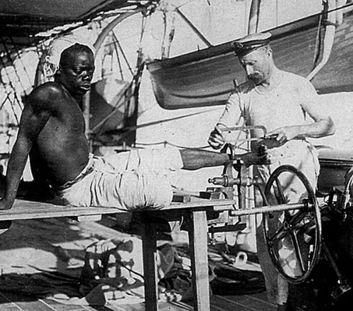 British Blacksmith Freeing A Slave By Cutting Off The Leg Irons—Peace Out, Chains!