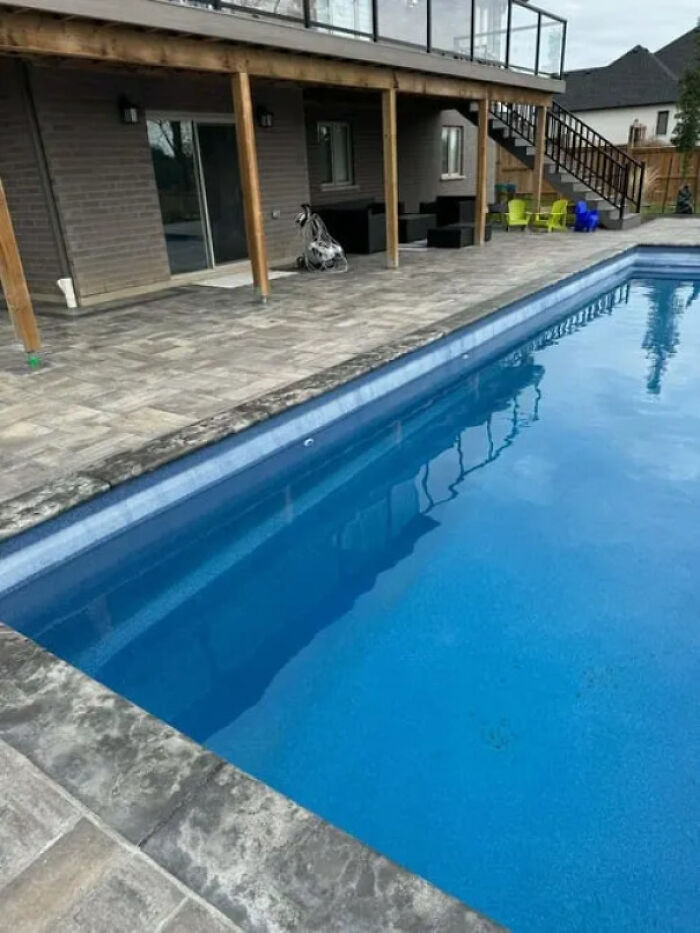 Polishing Hard-Water Calcium Off Fancy Infinity Pool Glass Walls
