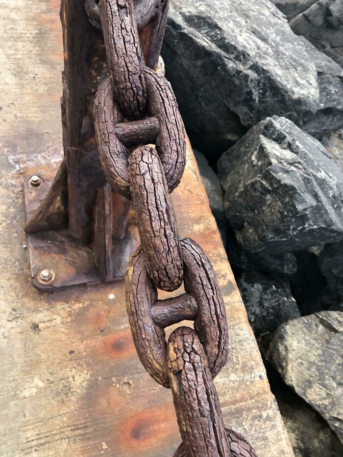 This Chain Is So Rusty It Looks Like Wood