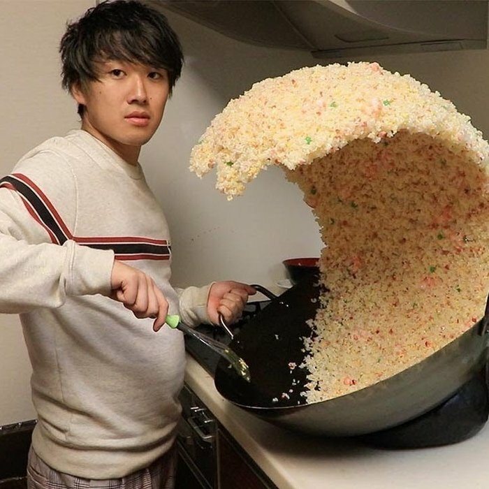 Guy Creating A Wave From Rice, Seriously Cool