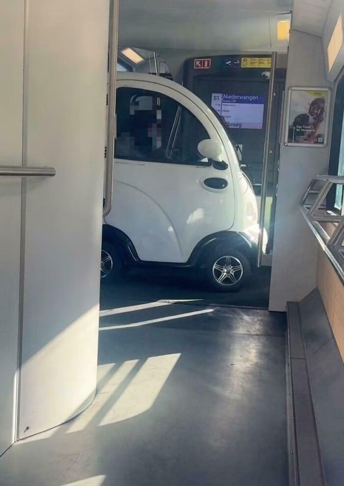 Swiss Woman Drives Microcar Onto Train Because It’s ‘Too Slow’