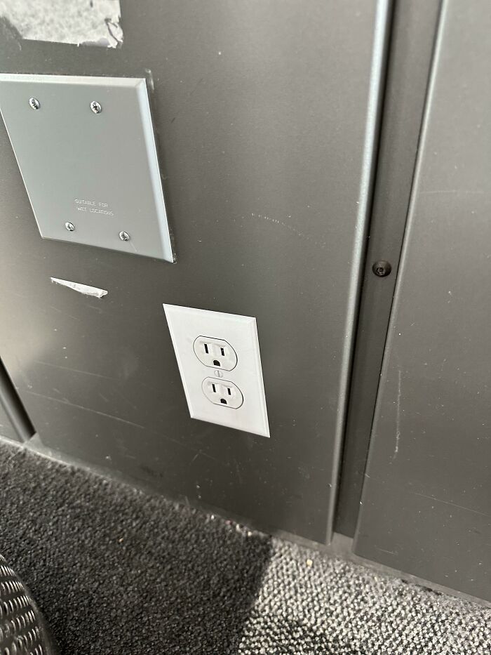 Tried Charging My Phone at Austin Airport but It Was Just a Sticker of an Outlet