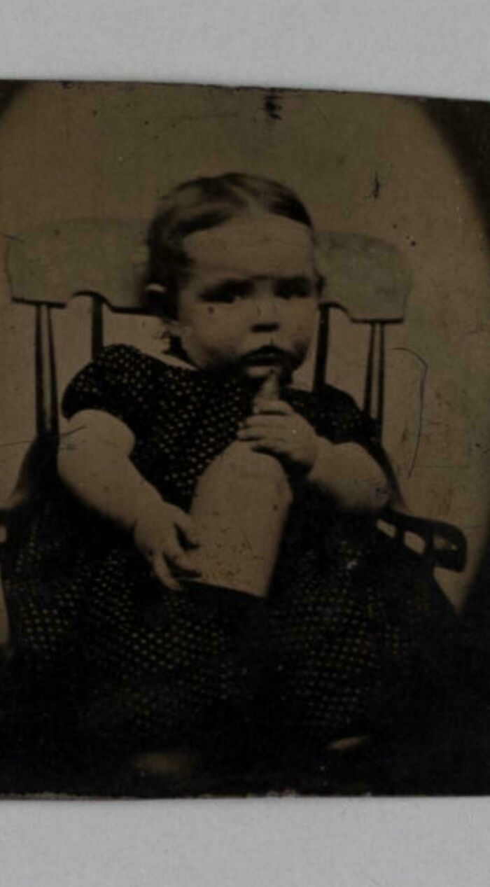 Tintype of George White with His Pewter Nursing Bottle, 1840s