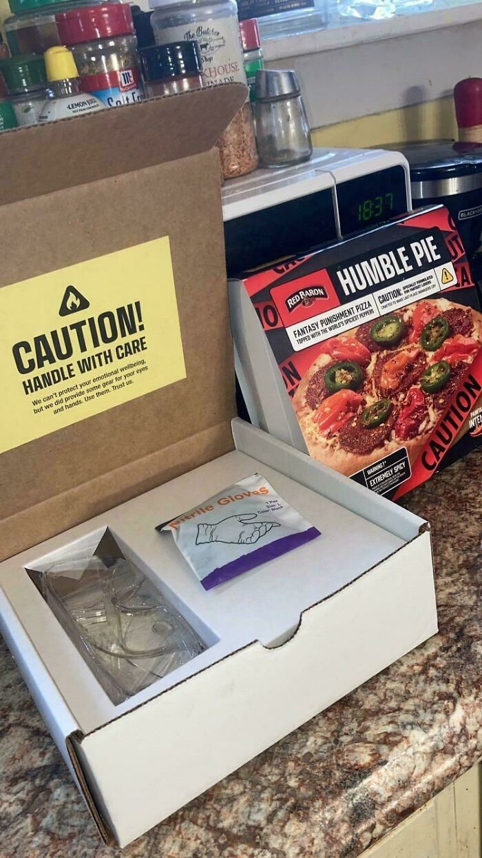 Fantasy Football Punishment Pizza So Hot It Comes with Gloves and Goggles