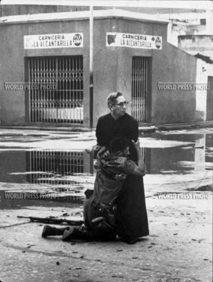 Catholic Priest Giving Final Rites Amid Sniper Fire – Intense!