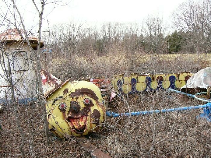 Old Theme Park with Overgrown Rollercoaster That Looks Like a Happy Caterpillar – Freaky!
