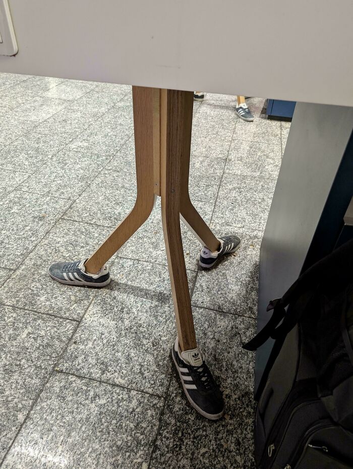 Why Does This Frankfurt Airport Table Have Three Shoes?