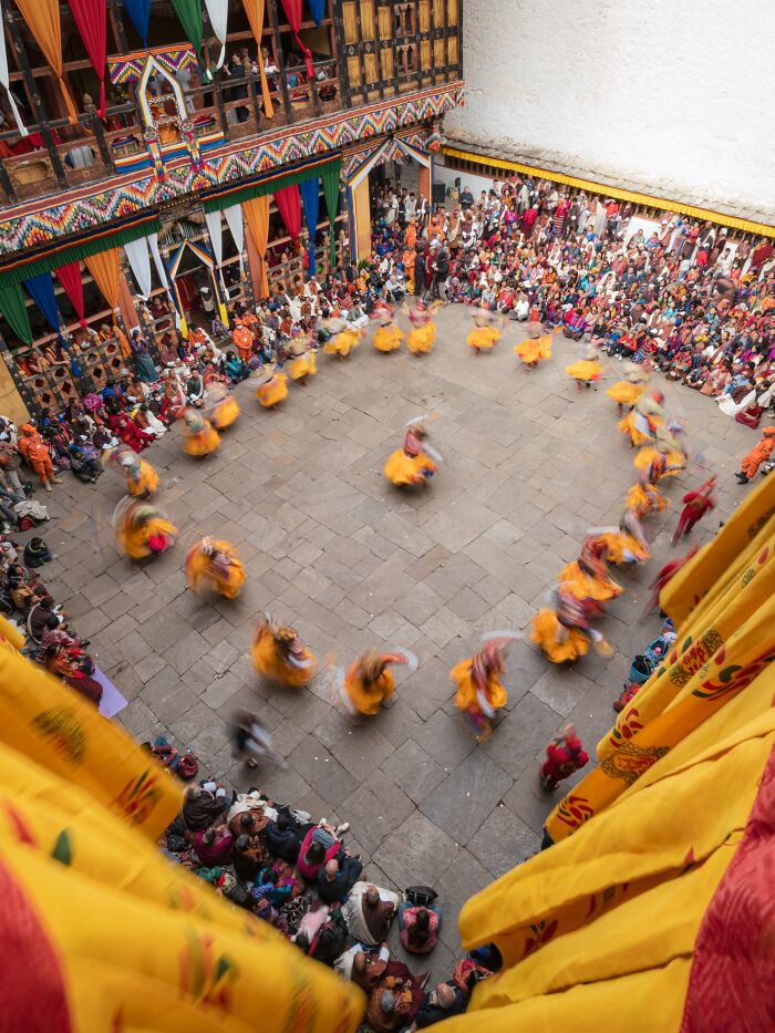 Masked Dancers At Bhutan Festival By Florian Kriechbaumer
