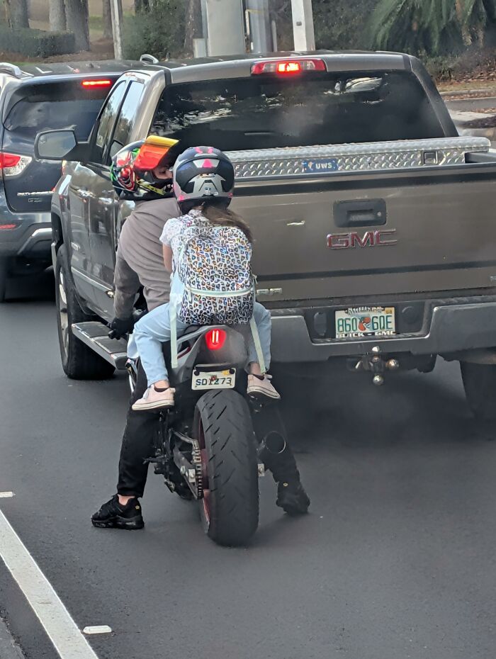 Not Sure This Is How You’re Supposed to Do It — At Least There’s a Helmet!