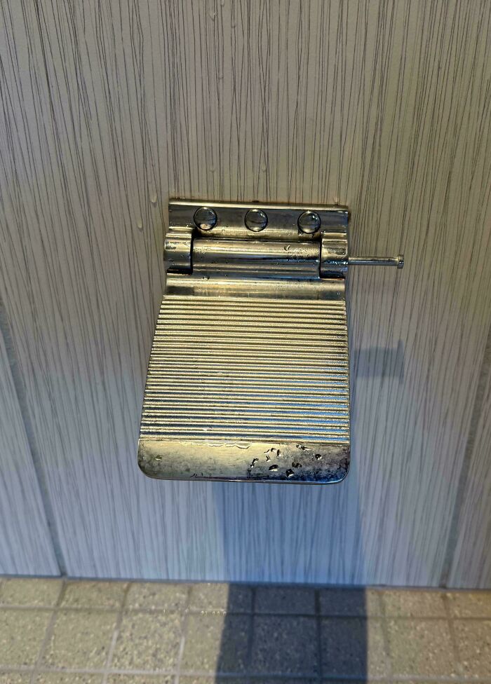A Flip-Down Footrest in the Shower For Leg Shaving—Genius!