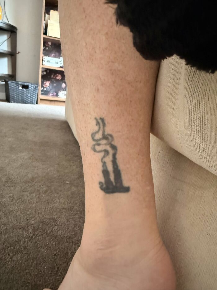 Two Candles, One Lit, One Snuffed Out—Old Tattoo Turning Into a Bigger Story