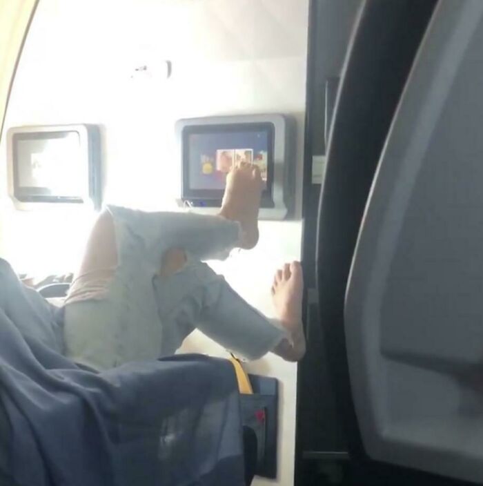 Foot-Scrolling Through the In-Flight Entertainment